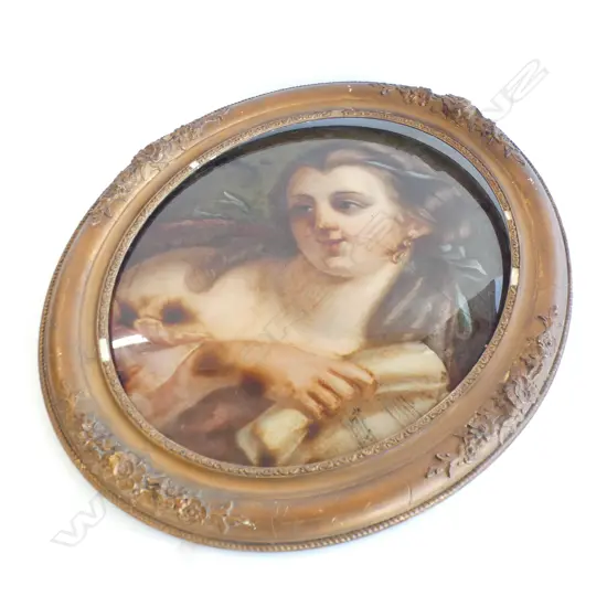 A reverse painted portrait on convex glass, of a woman in 18thC manner,